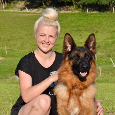 Michelle Solc, expert dog trainer and two-time Czech Youth National Champion, specialized in canine obedience